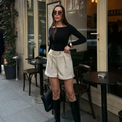 شورت ميني بحزام سلسلة وتفاصيل عين الطائر بيج 2