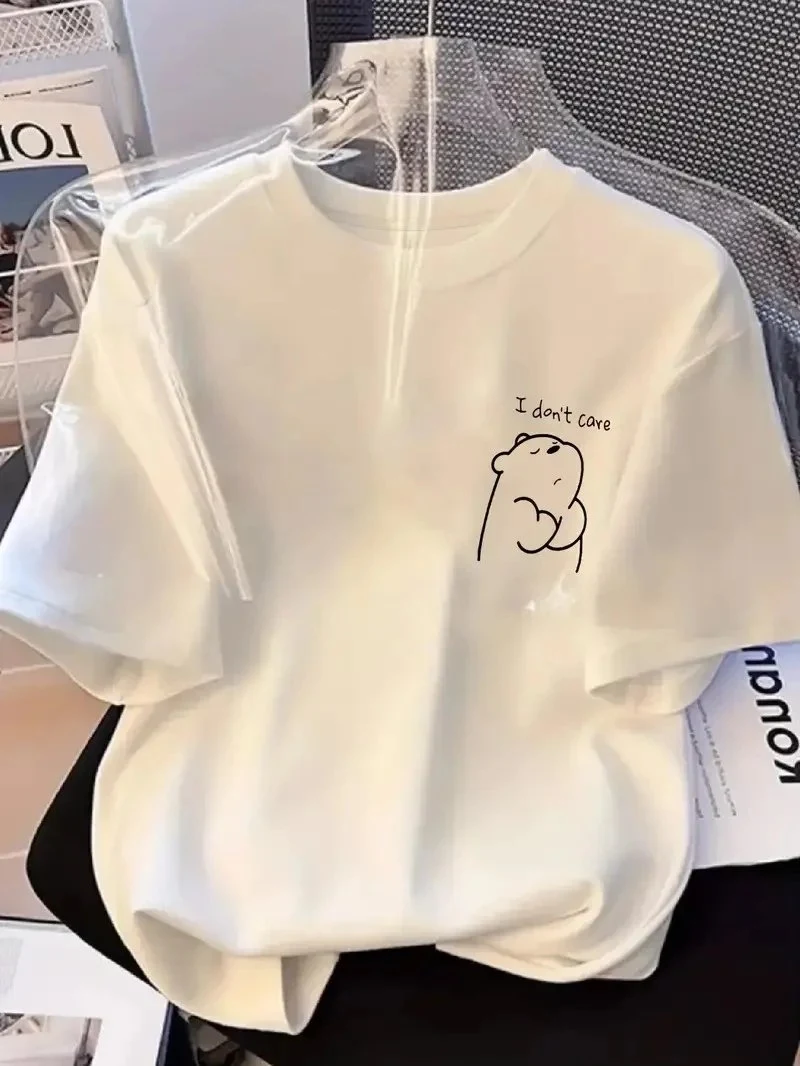 Női fehér oversized "Nem érdekel" nyomott póló